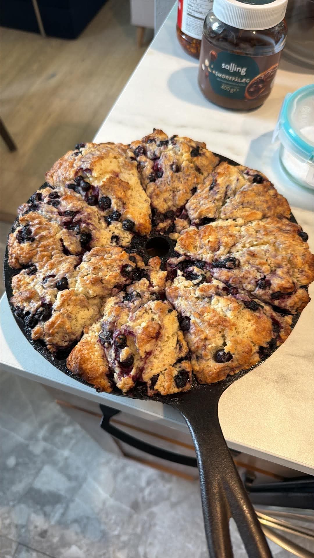 Huckleberry scones baked in a cast-iron scone pan